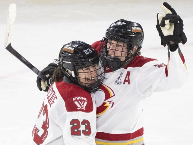 Jocelyne Larocque, left, seen celebrating with Charge teammate Shiann Darkangelo after an Ottawa goal against the Montreal Victoire in Round 1, isn't getting distracted despite the PWHL's decision to release expansion draft rules on Monday, just before the league playoff final begins.