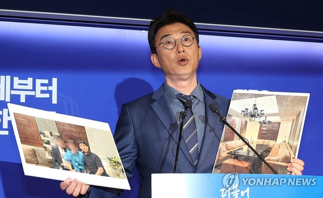 Rep. Noh Jong-myeon, a spokesperson for the Democratic Party's election committee, discloses photos at the party's headquarters in Seoul on May 19, 2025, of what he said showed Judge Jee Kui-youn of the Seoul Central District Court being treated at an expensive hostess bar. (Yonhap)