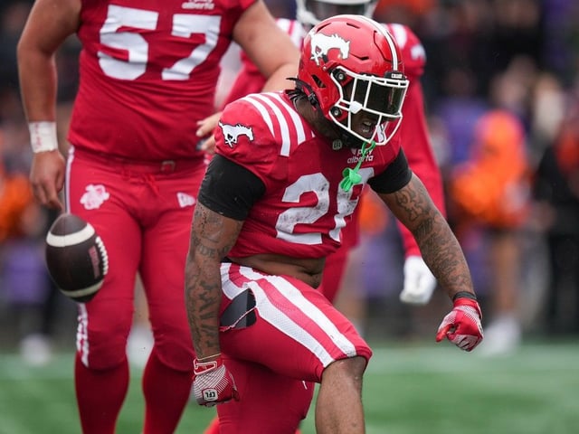 Calgary Stampeders' Tiyon Evans celebrates his touchdown against the B.C. Lions during the second half of a preseason CFL football game, in Langford, B.C., on Monday, May 19, 2025.