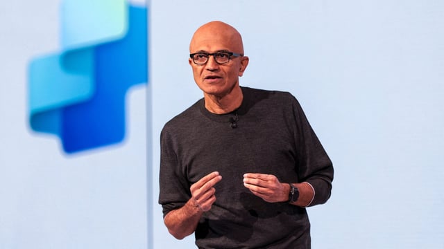 Microsoft employee interrupts Satya Nadella’s speech at Seattle conference (Photo by Jason Redmond / AFP)