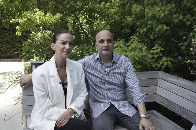 Yael and Adi Alexander, parents of freed Israeli-American hostage Eden Alexander, who was held captive by Hamas militants in the Gaza Strip, pose for a portrait in Tel Aviv, Israel, Monday, May 19, 2025. (AP Photo/Maya Alleruzzo)