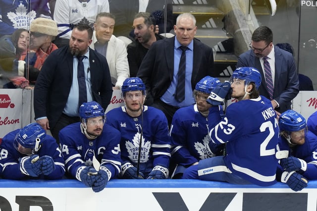 Toronto Maple Leafs players and coaching staff react during third period of their 6-1 loss to the Florida Panthers in NHL Stanley Cup playoff hockey action in Toronto, Sunday, May 18, 2025.