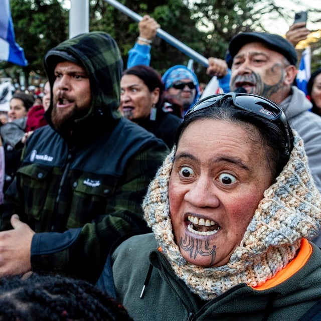 Protesters perform a haka outside parliament in Wellington, New Zealand, Tuesday, May 20, 2025.
