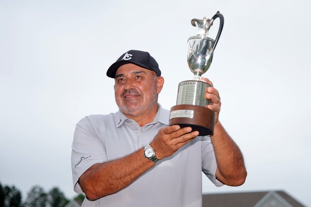 Angel Cabrera of Argentina poses with the trophy after winning the final round of the Regions Tradition 2025 at Greystone Golf and Country Club on May 19, 2025 in Birmingham, Alabama.