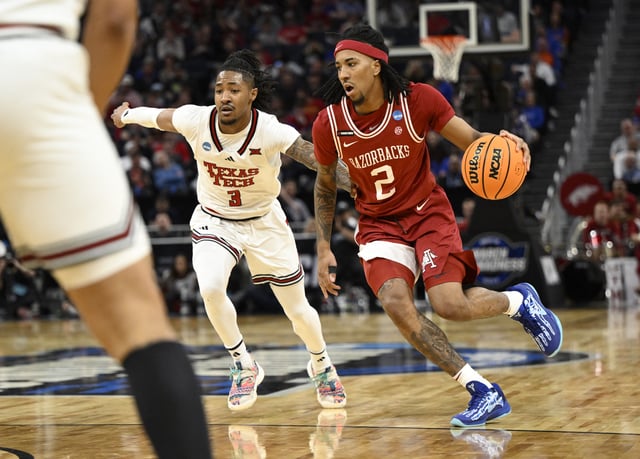 Mar 27, 2025; San Francisco, CA, USA; Arkansas Razorbacks guard Boogie Fland (2) drives to the hoop past Texas Tech Red Raiders guard Elijah Hawkins (3) during the first half during a West Regional semifinal of the 2025 NCAA tournament at Chase Center. Mandatory Credit: Eakin Howard-Imagn Images/File Photo