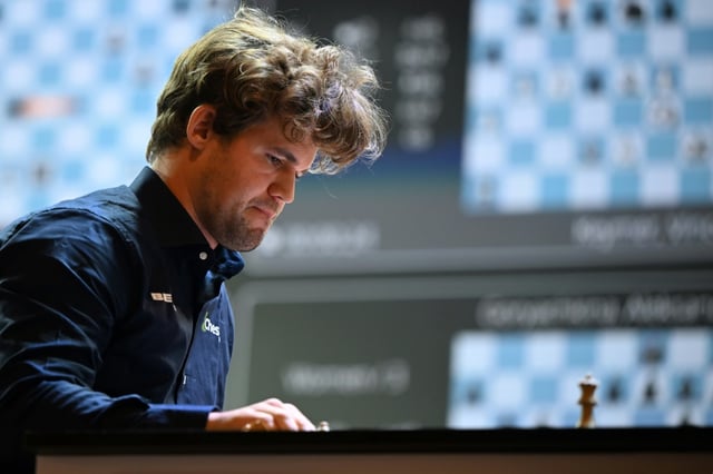 Norwegian grandmaster Magnus Carlsen, pictured during a 2024 match, took on a team of 143,000 opponents