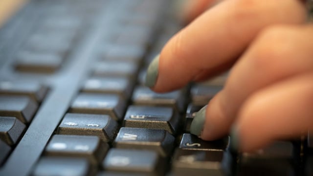A woman types on a keyboard in this photo taken on Oct. 8, 2019. Jobs traditionally done by women are more vulnerable to the impact of artificial  intelligence than those done by men, especially in high-income countries, a report by the UN's International Labour Organization showed on Tuesday.