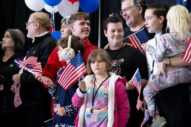 The first group of Afrikaners from South Africa arrive at Washington Dulles International Airport in Dulles, Virginia, on May 12, 2025. (Photo by Saul Loeb/AFP/ Getty Images)