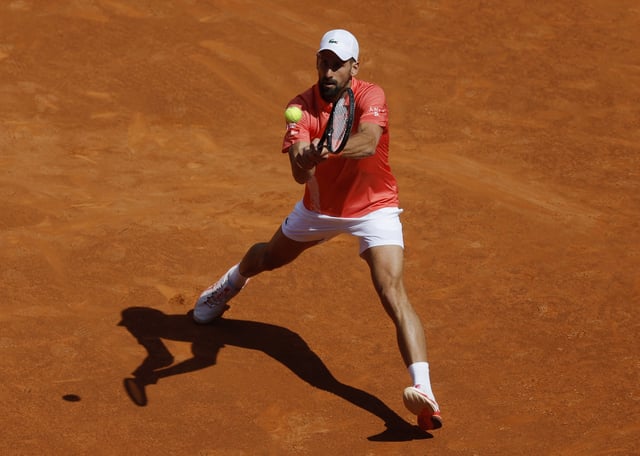 Tennis - Madrid Open - Park Manzanares, Madrid, Spain - April 26, 2025 Serbia's Novak Djokovic in action during his round of 64 match against Italy's Matteo Arnaldi REUTERS/Juan Medina