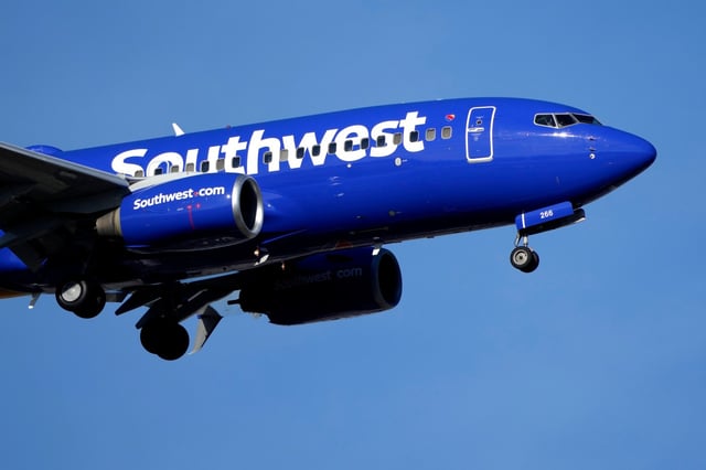 A Southwest Airlines aircraft lands at St. Louis Lambert International Airport Wednesday, Dec. 28, 2022, in St. Louis. (Jeff Roberson/AP)