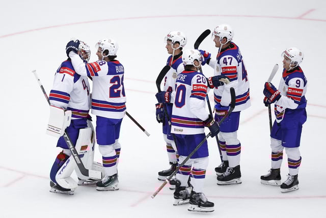Ice Hockey - IIHF World Championships - Group B - Czech Republic v United States - Jyske Bank Boxen Arena, Herning, Denmark - May 20, 2025  United States players celebrate after the match REUTERS/David W Cerny