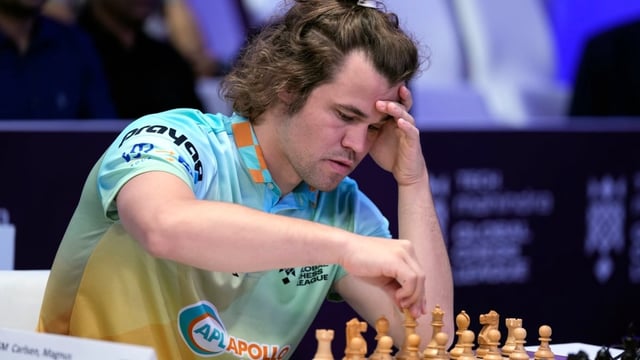 Norwegian chess grandmaster Magnus Carlsen plays against Poland's Jan-Krzysztof Duda during Global Chess League in Dubai, U.A.E., on July 1, 2023. On Monday, Carlsen was forced into a draw during an online freestyle match against 143,000 other players, spanning 46 days.