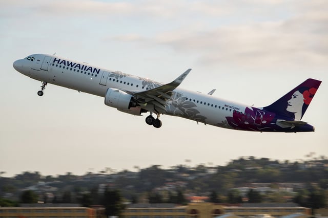 FILE: A Hawaiian Airlines Airbus A321 departs San Diego International Airport in August 2024.
