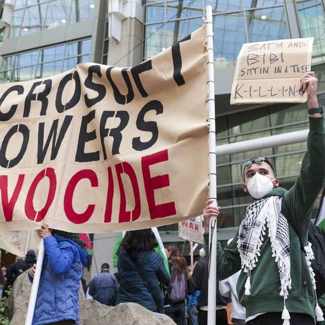 Pro-Palestinian demonstrators protest outside the Microsoft Build conference at the Seattle Convention Center in Seattle, Washington on May 19, 2025. (Photo by Jason Redmond / AFP) (Photo by JASON REDMOND/AFP via Getty Images) 