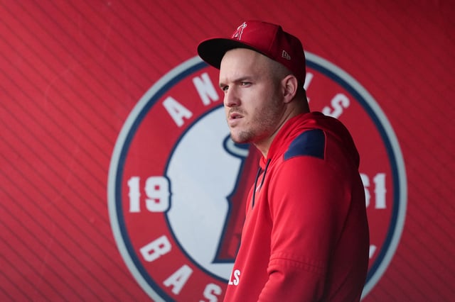 May 9, 2025; Anaheim, California, USA; Los Angeles Angels right fielder Mike Trout watches in the dugout during the game at bat at Angel Stadium. Mandatory Credit: Kirby Lee-Imagn Images/File Photo