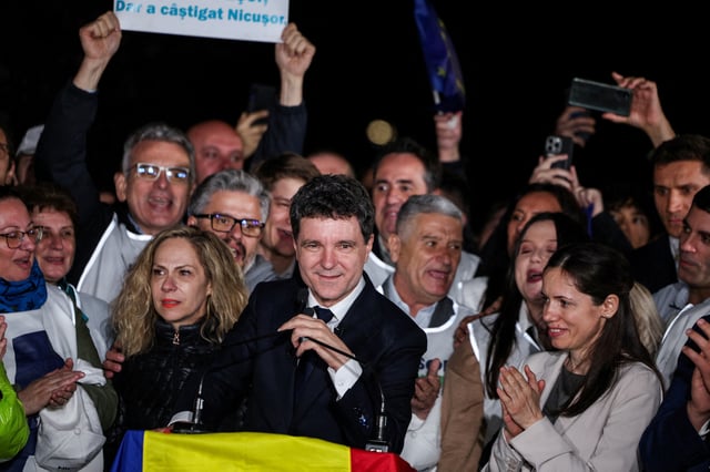 Presidential candidate Nicusor Dan speaks as he reacts to exit polls of Romania's second round of the presidential election, in Bucharest, Romania, May 18, 2025. REUTERS/Stoyan Nenov/File Photo