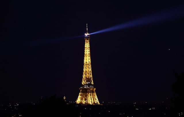 A view shows the illuminated Eiffel Tower in Paris, France, June 26, 2023. REUTERS/Stephanie Lecocq/File Photo