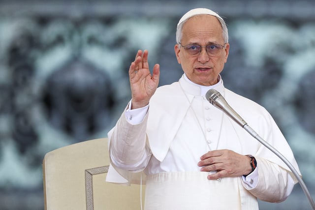 Pope Leo XIV blesses faithfuls as he holds his first general audience in St. Peter's Square, at the Vatican, May 21, 2025. REUTERS/Guglielmo Mangiapane/File Photo