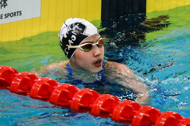 China's Yu Zidi reacts after finishing the women's 200 meters freestyle semifinal at the 2025 National Swimming Championships in Shenzhen, in China's southern Guangdong province on May 19, 2025. (Photo by AFP) / China OUT (Photo by -/AFP via Getty Images)          