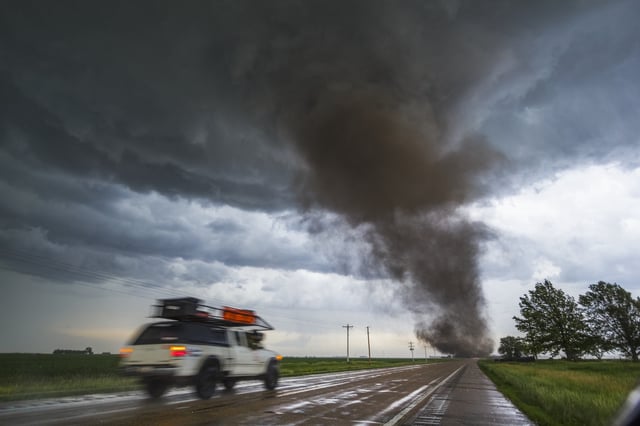 A tornado from a tornadic supercell approaches from the south, west of York Nebraska June 20, 2011.