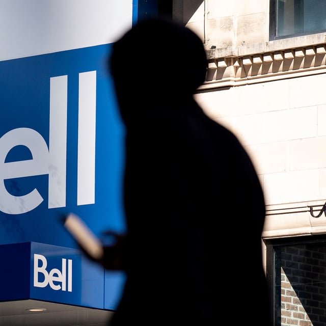 A widespread internet outage has left some Bell customers without service on Wednesday morning. People walk bast a Bell store in downtown Montreal on Wednesday, May 7, 2025. THE CANADIAN PRESS/Christopher Katsarov