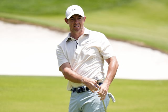 May 18, 2025; Charlotte, North Carolina, USA; Rory McIlroy watches his shot on the 15th hole during the final round of the PGA Championship golf tournament at Quail Hollow. Mandatory Credit: Jim Dedmon-Imagn Images/File Photo