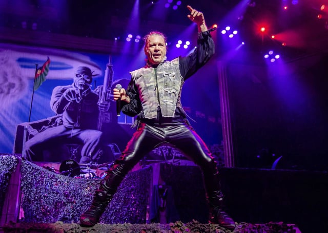 Bruce Dickinson of Iron Maiden performs onstage. The British heavy metal band is urging concertgoers to “severely limit” mobile phone usage during its Run for Your Lives World Tour, telling them to live “in the moment.”