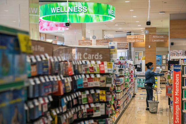 A woman shops inside of a Rite Aid store underneath a DeepCam security camera in New York City, New York, U.S., June 25, 2020. Picture taken June 25, 2020. REUTERS/Lucas Jackson/File photo