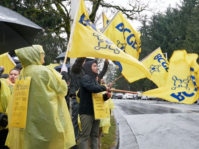 LifeLabs employees at a rally outside the company's main office in Burnaby on Feb, 16, 2025, to kick off a series of rotating strikes by LifeLabs workers over wages, staffing and other concerns.