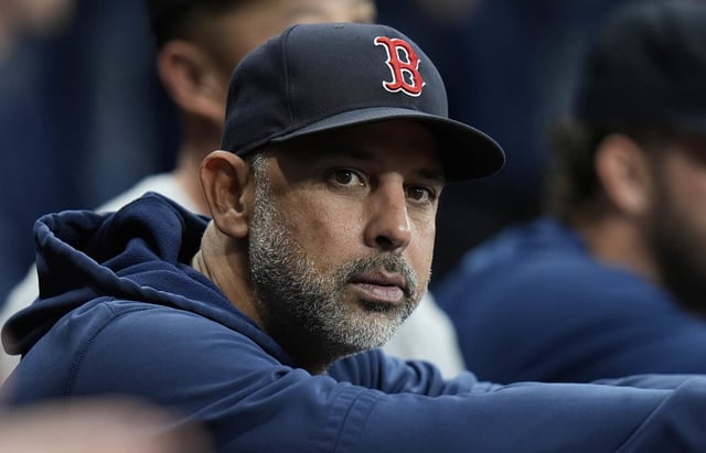 Boston Red Sox manager Alex Cora watches against the Tampa Bay Rays during the first inning of a baseball game Wednesday, Sept. 18, 2024, in St. Petersburg, Fla. 