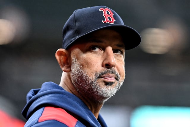 Manager Alex Cora of the Boston Red Sox watches the game against the Baltimore Orioles on April 2, 2025.