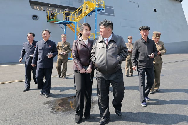 North Korean leader Kim Jong Un with his daughter Ju Ae supervising the test firing in images released on April 30, 2025.