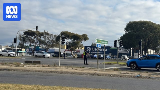 road intersection and police guiding traffic.