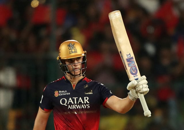 Cricket - Indian Premier League - IPL - Royal Challengers Bengaluru v Chennai Super Kings - M. Chinnaswamy Stadium, Bengaluru, India - May 3, 2025 Royal Challengers Bengaluru' Jacob Bethell celebrates after reaching his half century REUTERS/Stringer/File Photo