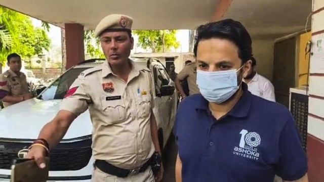 Ashoka University professor Ali Khan Mahmudabad being escorted by Haryana Police personnel after his arrest in Sonepat on Sunday. 