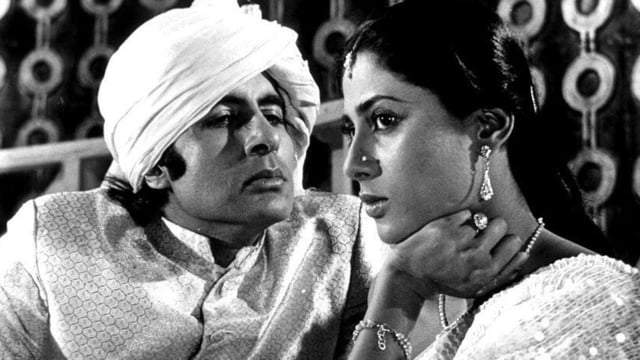 Amitabh Bachchan and Smita Patil in a still from 1982 film Namak Halaal.