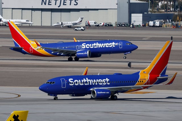 LAS VEGAS, NEVADA - MARCH 15: A Southwest Airlines Boeing 737 airplane departs from Harry Reid International Airport as another airplane taxis on March 15, 2025 in Las Vegas, Nevada. (Photo by Kevin Carter/Getty Images)