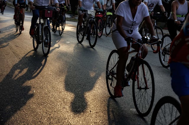 San Antonio cyclists travel down Ashby Place on Wednesday evening during the annual Ride of Silence. They rode nearly 10 miles near downtown San Antonio in a commemorative procession to honor cyclists killed or injured on public roads.