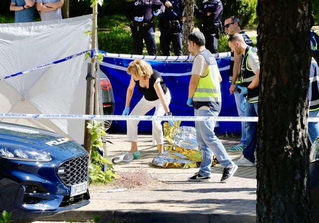 La Policía Científica, este miércoles, junto al cadáver de Andriy Portnov, en Pozuelo de Alarcón