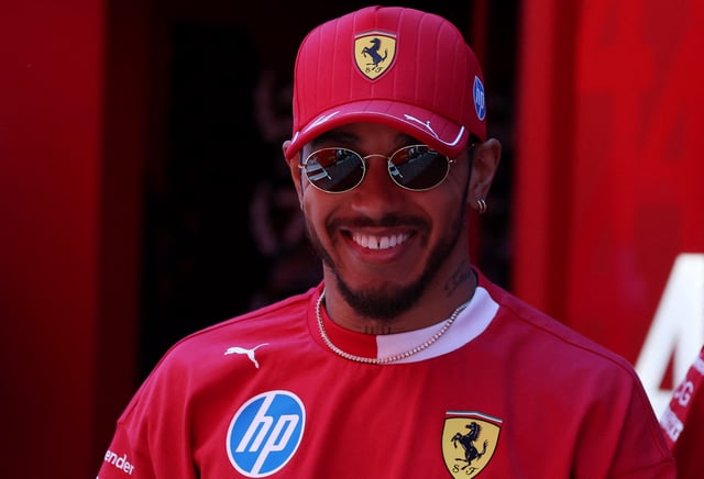 Formula One F1 - Emilia Romagna Grand Prix - Autodromo Enzo e Dino Ferrari, Imola, Italy - May 18, 2025 Ferrari's Lewis Hamilton arrives ahead of the race REUTERS/Florion Goga