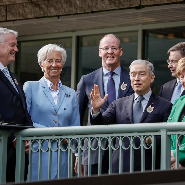 Finance Minister François-Philippe Champagne, centre, speaks with colleagues at the G7 finance ministers meeting in Banff, Alta., on May 21.