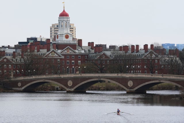 A sculler rows down the Charles River near Harvard University onApril 15, 2025, in Cambridge, Mass.