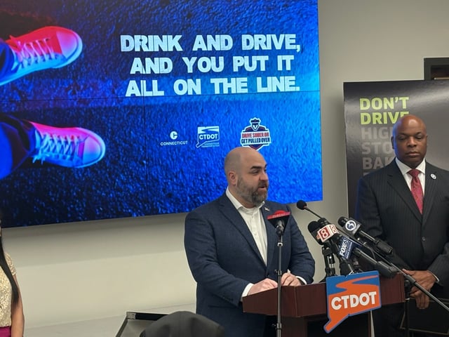CTDOT commissioner Garrett Eucalitto speaks at the Connecticut Department of Transportation headquarters in Newington on Thursday morning during a press conference. (Sean Krofssik/Hartford Courant)