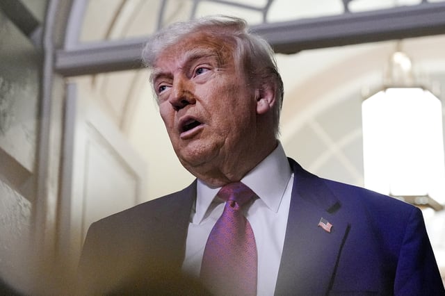 U.S. President Donald Trump speaks to members of the media, on the day of a closed House Republican Conference meeting on Capitol Hill in Washington, D.C., U.S., May 20, 2025. REUTERS/Ken Cedeno/File Photo