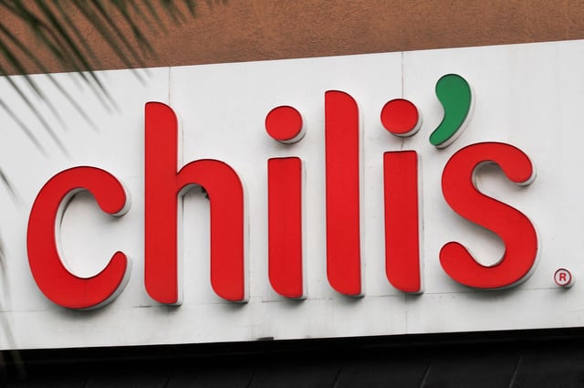 The Chili's logo is seen on the facade of a restaurant in Mexico City, Mexico July 31, 2024. REUTERS/Henry Romero/File Photo