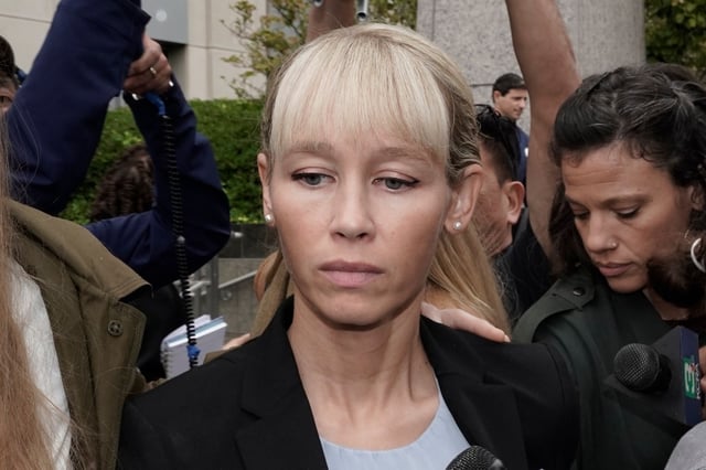 Sherri Papini leaves the federal courthouse after Federal Judge William Shubb sentenced her to 18 months in federal prison, in Sacramento, Calif., Monday, Sept. 19, 2022. (AP Photo/Rich Pedroncelli)