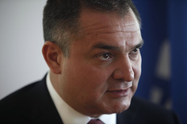 FILE - Mexican Security Chief Genaro Garcia Luna speaks during an interview in Mexico City, Sept. 3, 2009. (AP Photo/Dario Lopez-Mills, File)