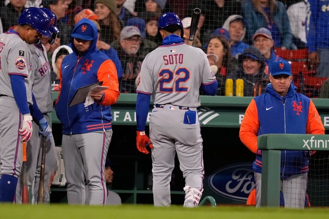 New York Mets&#39; Juan Soto (22) heads to the dugout after striking out against the Boston Red Sox in the sixth inning of a baseball game at Fenway Park, Wednesday, May 21, 2025, in Boston. (AP Photo/Charles Krupa)