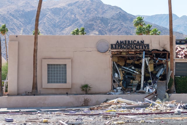 Debris is seen outside a damaged American Reproductive Centers fertility clinic after a bomb blast outside the building in Palm Springs, California, on May 17, 2025. A bomb blast outside a California fertility clinic killed one person Saturday, in what the US attorney general called an “unforgivable” attack. The blast ripped through downtown Palm Springs, badly damaging the clinic and blowing out the windows and doors of other nearby buildings. (Photo by Gabriel Osorio / AFP) (Photo by GABRIEL OSORIO/AFP via Getty Images)