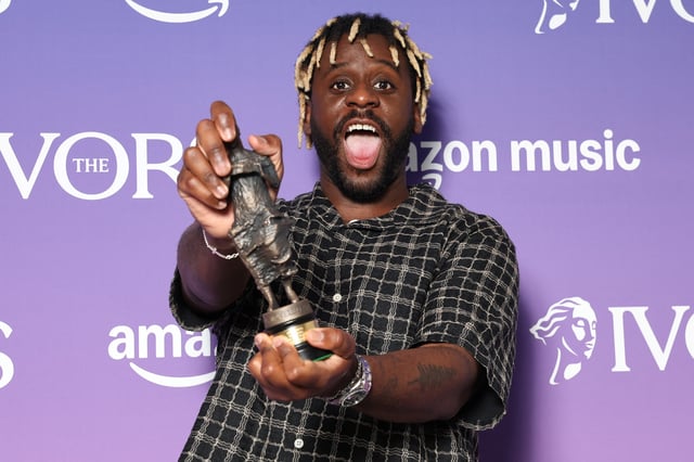 Myles Smith poses for a portrait holding his 'PRS for Music' Most Performed Work award at the Ivor Novello Awards in London, Britain, May 22, 2025. REUTERS/Toby Melville